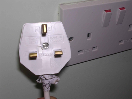 Figure 1:  Standard Irish 3-pin plug and electricity socket.