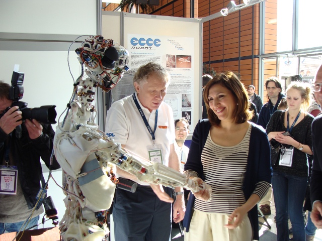 Dr. Nora Berra, MEP, the French Secretary of State for Health, meets ECCEROBOT at the Innorobo trade show, Lyon, 2011.